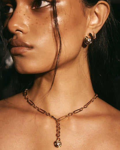 Wave Bezel Twist Studs