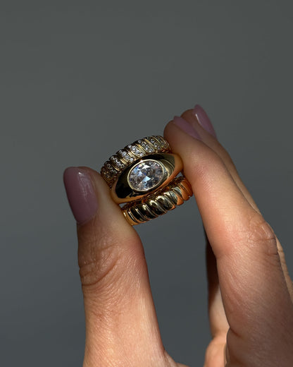 The Oval Orbit Bezel Ring