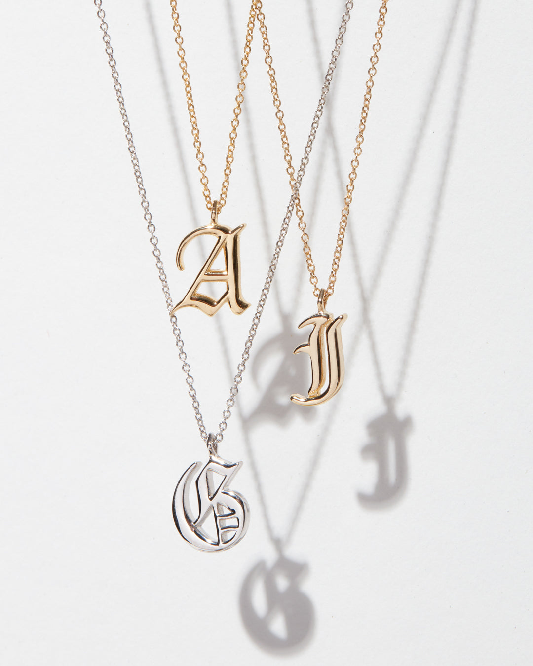 The Initial Charm Necklace [Old English]