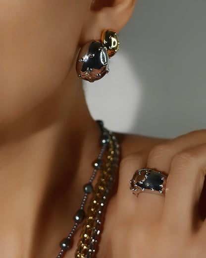 The Pave Molten Studs